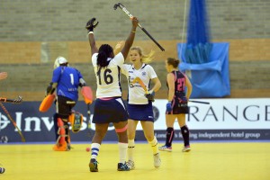 East Grinstead captain JoJo Davis congratulates scorer Sophie Bray