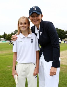 CANTERBURY, ENGLAND - AUGUST 11: Charlotte Edwards, Captain of England poses with match mascot prior to the start of play during day one of the Kia Women's Test of the Women's Ashes Series between England and Australia Women at The Spitfire Ground on August 11, 2015 in Canterbury, United Kingdom. (Photo by Dan Mullan/Getty Images)