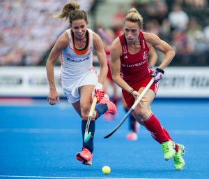 Great Britain's Susannah Townsend goes past Ellen Hoog of the The Netherlands. Great Britain v The Netherlands - Hockey Champions Trophy, Trent Park, London, UK on 19 June 2016. Photo: Simon Parker